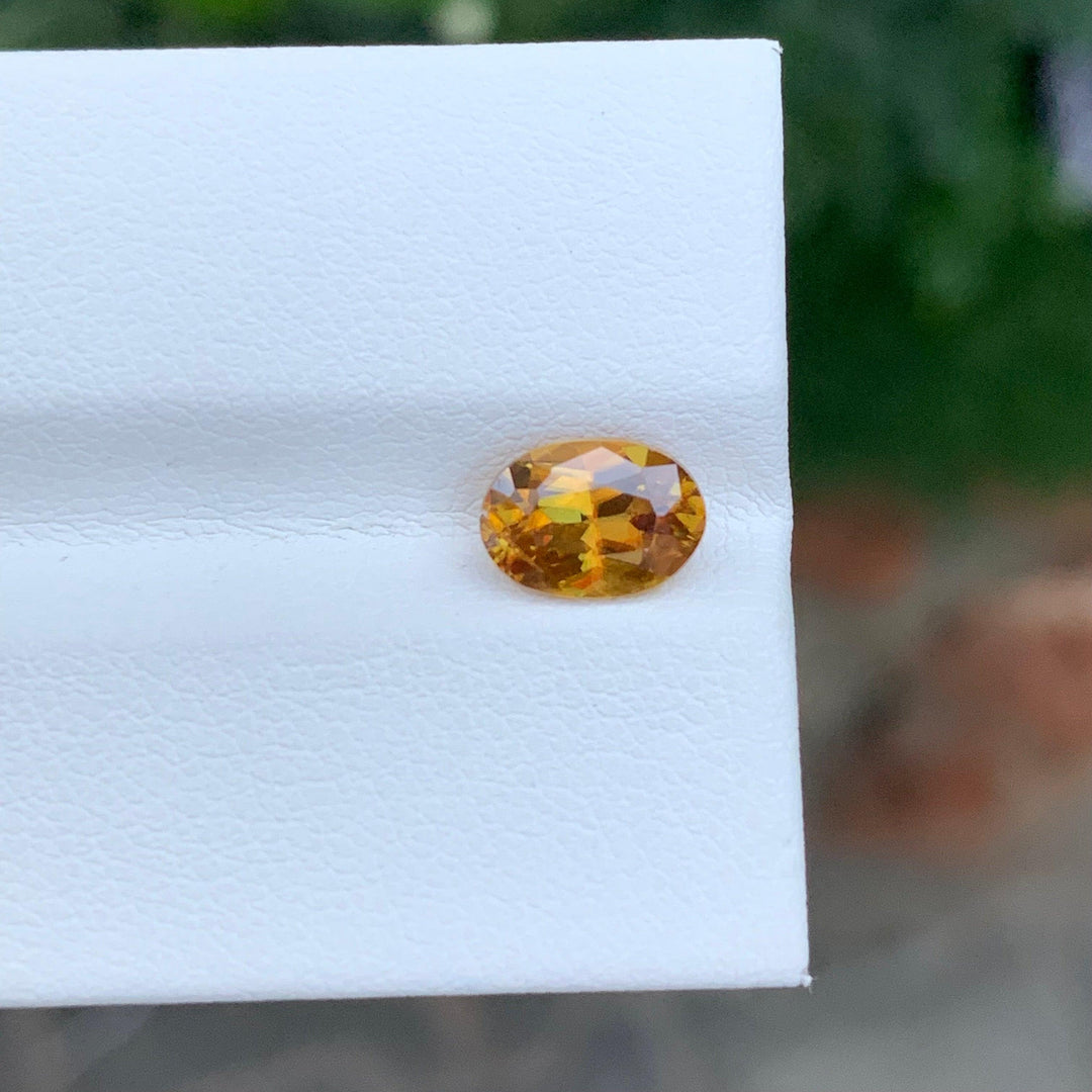 1.50 Carats Yellowish Orange Faceted Sphene ( Titanite )