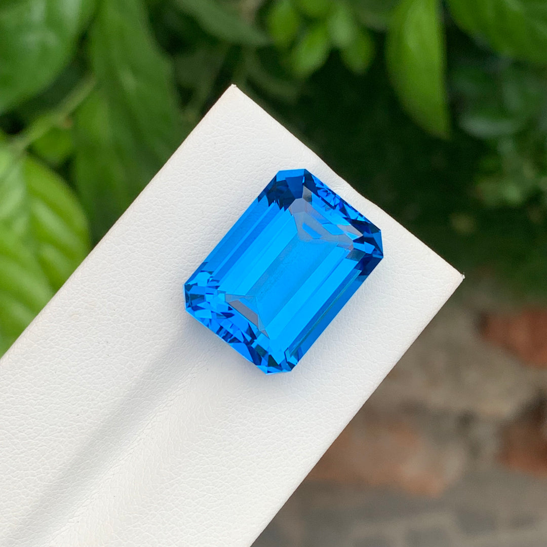 31.28 Carats Faceted Emerald Shape Swiss Blue Topaz